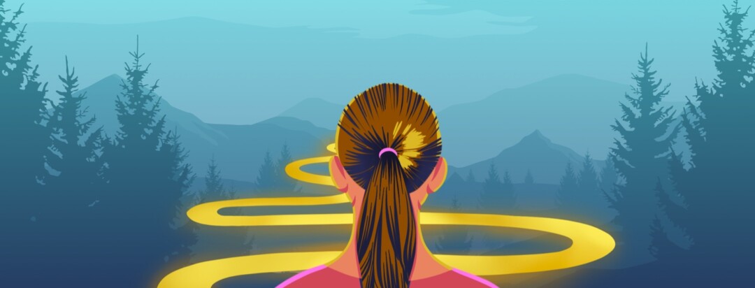 A woman looks out at a wide open landscape with a bright yellow path running through it.